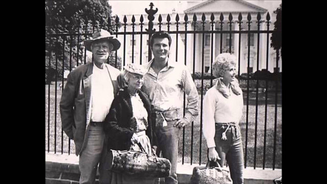 Group people fence building gate free wallpaper - medium preview image