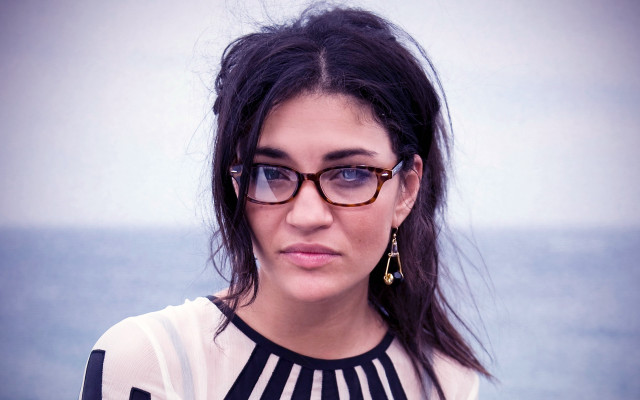 Woman glasses looking distance blue free wallpaper - medium preview image