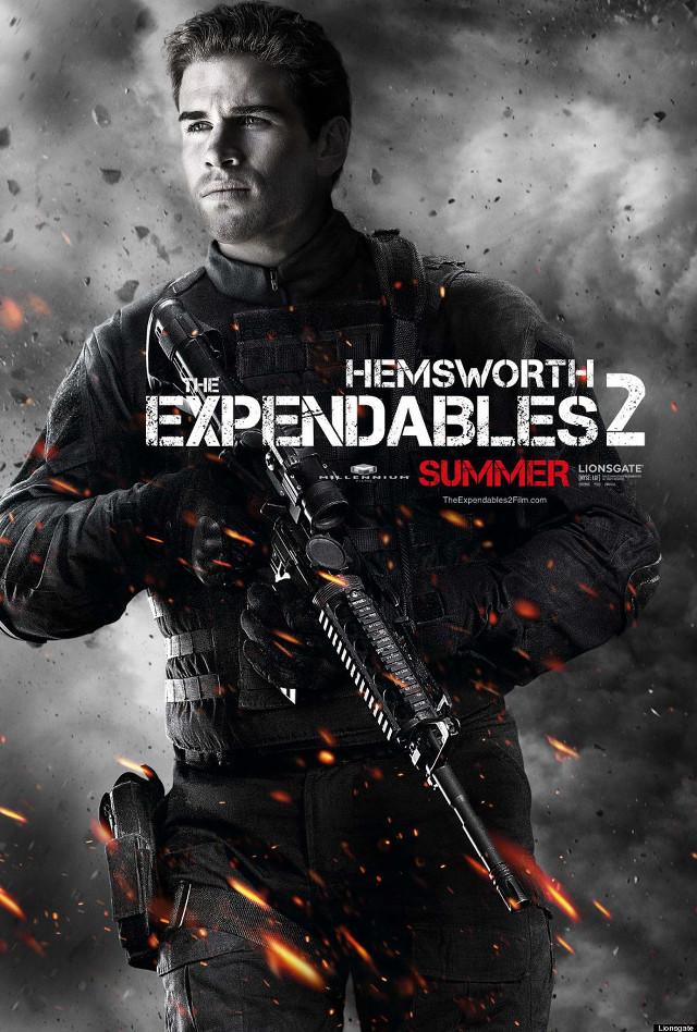 Man holding gun expendables2 poster free wallpaper - medium preview image