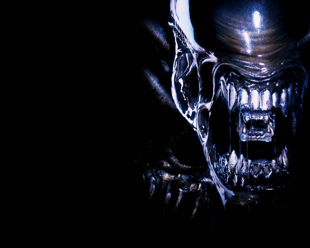 Creepy alien face closeup dark free wallpaper - medium preview image