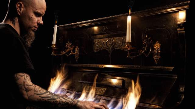 Man tattoo piano flames candle free wallpaper - medium preview image