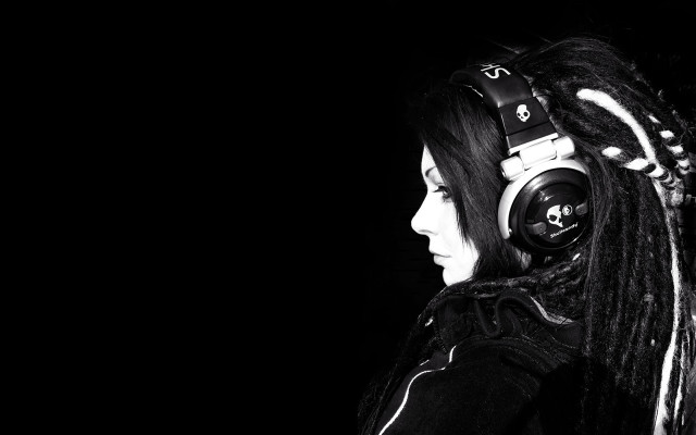 Woman dreadlocks headphones looking away #3 free wallpaper for desktop - medium preview image