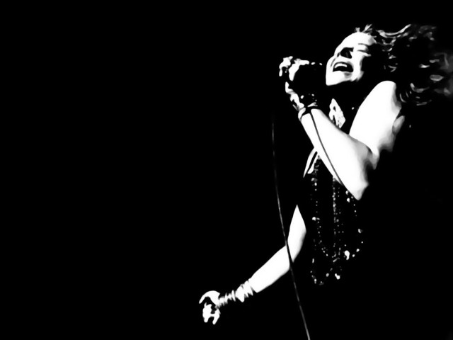 Woman singing microphone stage performance free wallpaper - medium preview image
