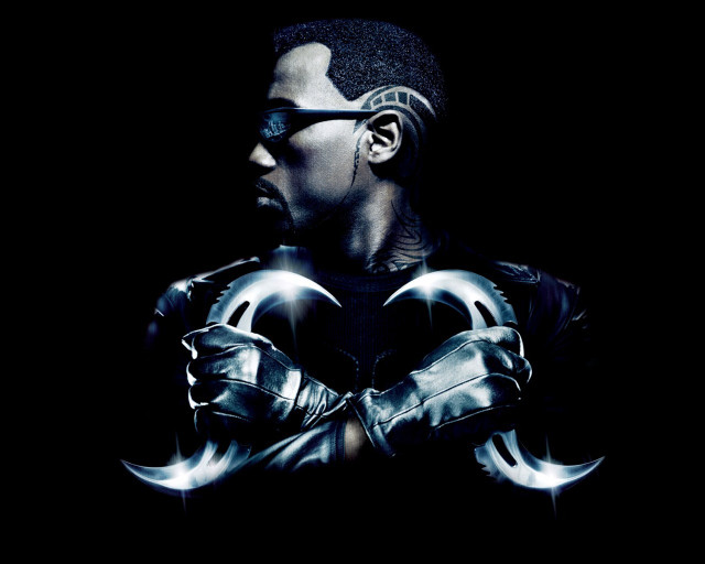 Man black shirt glasses holding free wallpaper - medium preview image