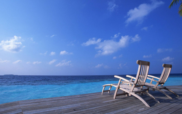 Chairs dock ocean palm tree free wallpaper - medium preview image