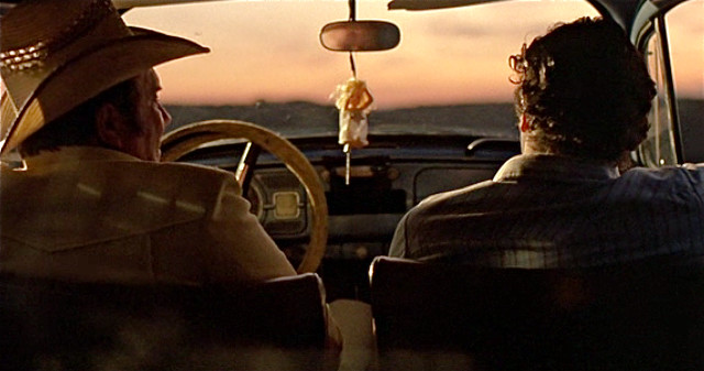 Two men sitting car steering free wallpaper - medium preview image