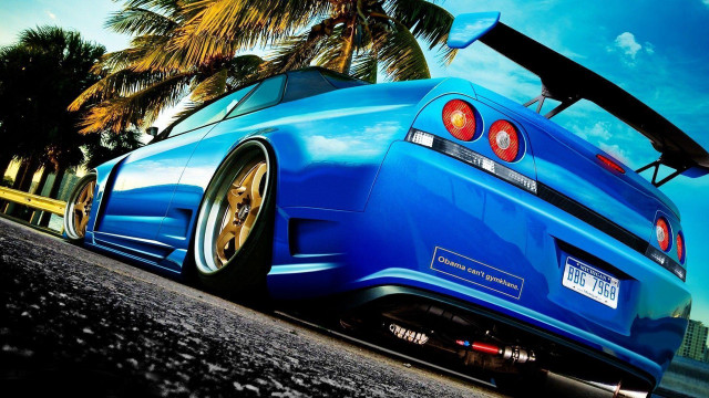 Blue car palm trees surfboard free wallpaper - medium preview image