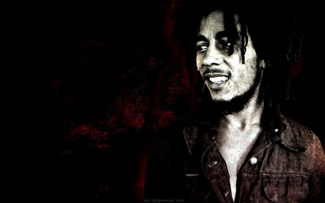 Man dreadlocks smiling camera dark free wallpaper - medium preview image