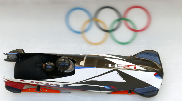 Person car olympic sign wall free wallpaper - medium preview image