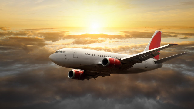 Jetliner cloudy sky sunset sun #2 free wallpaper - medium preview image