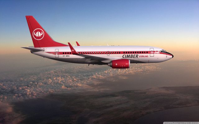 Jetliner flying cloudy sky above #2 free wallpaper - medium preview image