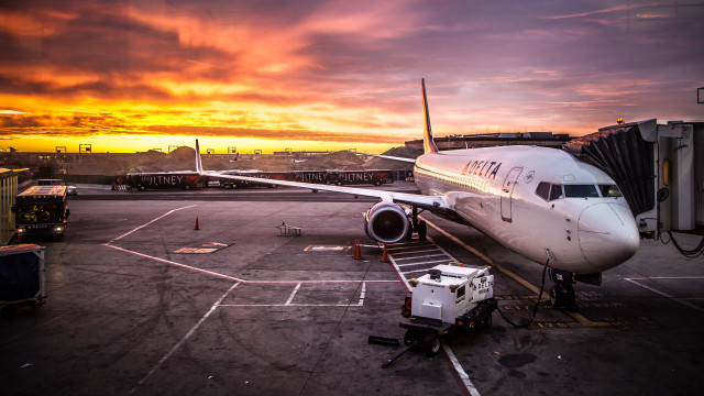Plane parked tarmac airport sunset #4 free wallpaper - medium preview image