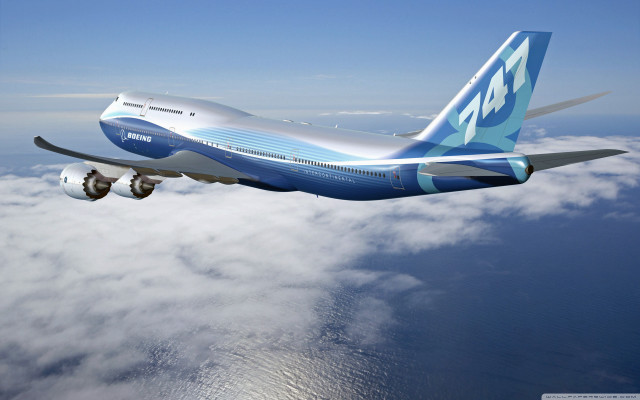 Large jetliner blue sky clouds #5 free wallpaper - medium preview image