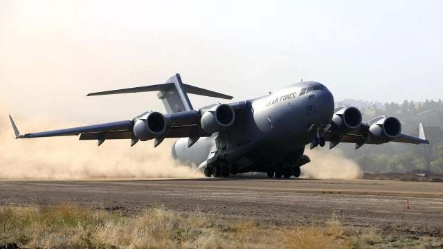 Airplane takeoff runway dust hill free wallpaper - medium preview image