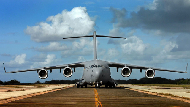 Airplane runway cloudy sky yellow free wallpaper - medium preview image