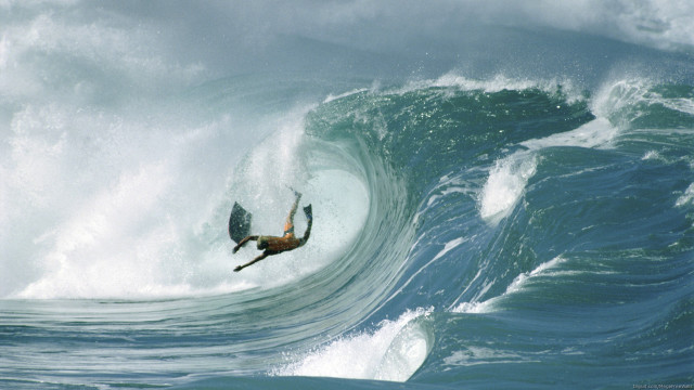 Man riding wave surfboard ocean #5 free wallpaper - medium preview image