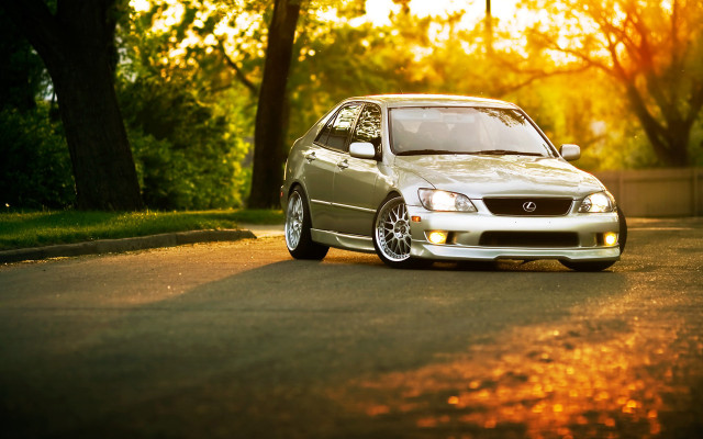 Silver car parked road trees free wallpaper - medium preview image