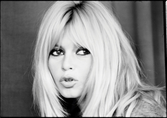 Blonde woman tongue out black free wallpaper - medium preview image