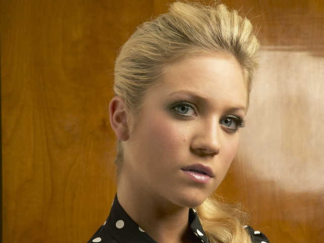 Woman blackshirt polkadottie serious portrait free wallpaper for desktop - medium preview image