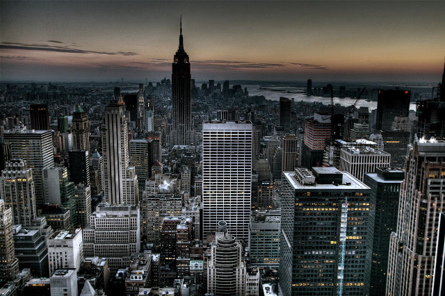 Cityscape tall buildings river sunset free wallpaper - medium preview image