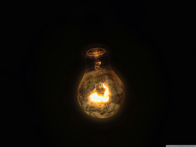 Light bulb glowing yellow reflection free wallpaper - medium preview image