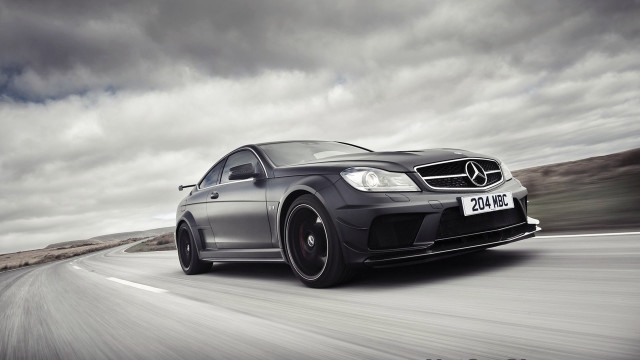 Mercedes c6 amg driving cloudy free wallpaper - medium preview image