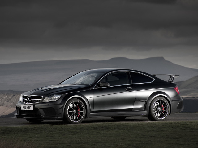 Silver car parked road mountains free wallpaper - medium preview image