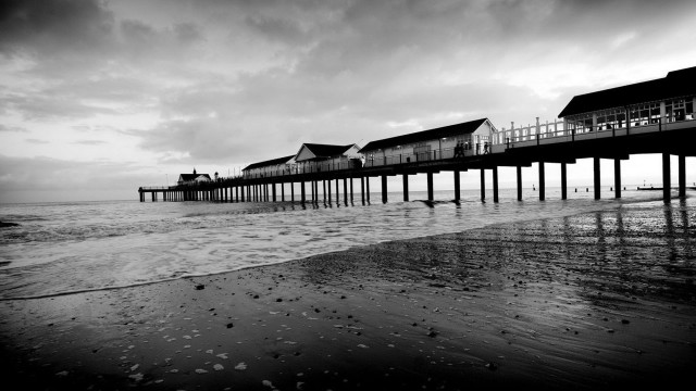Pier houses water waves scenery free wallpaper - medium preview image