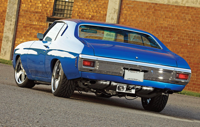 Blue car parked road brick free wallpaper - medium preview image