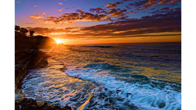 Sunset ocean waves crashing cliff free wallpaper - medium preview image
