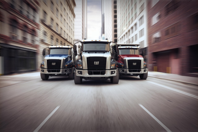 Trucks driving city street tall free wallpaper - medium preview image