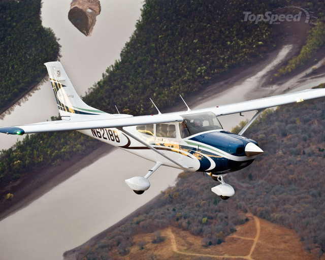 Small plane forest hillside river free wallpaper - medium preview image