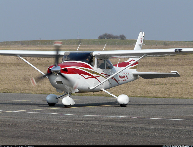 Small plane runway person walking free wallpaper - medium preview image