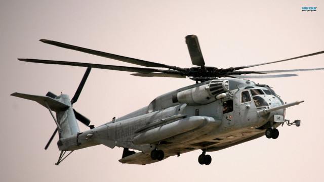 Helicopter flying sky person cockpit #2 free wallpaper - medium preview image