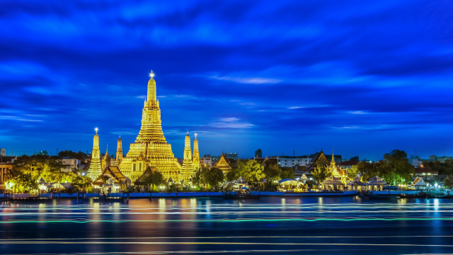 Large building spire night water free wallpaper - medium preview image