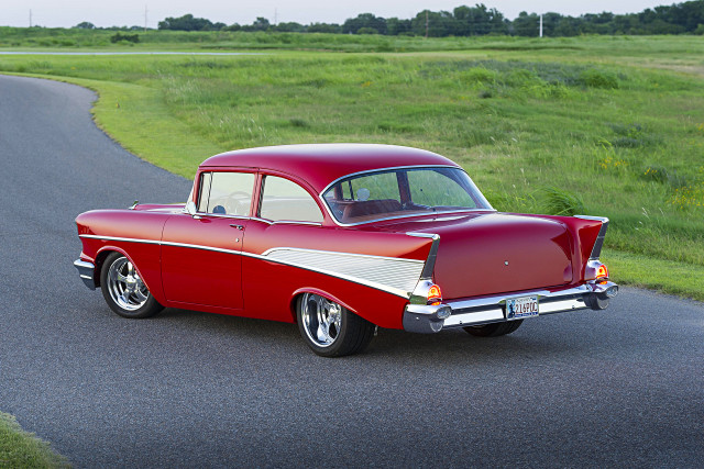Red white car parked field free wallpaper - medium preview image