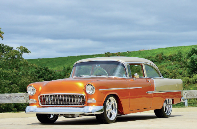 Orange white car parked street free wallpaper - medium preview image