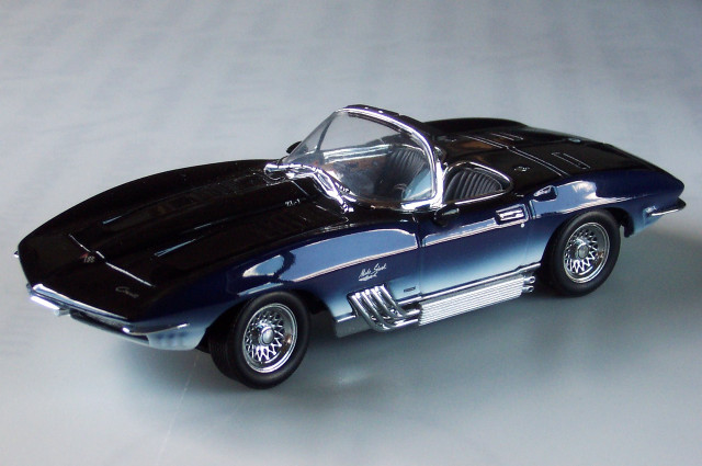 Toy car white surface gray free wallpaper - medium preview image