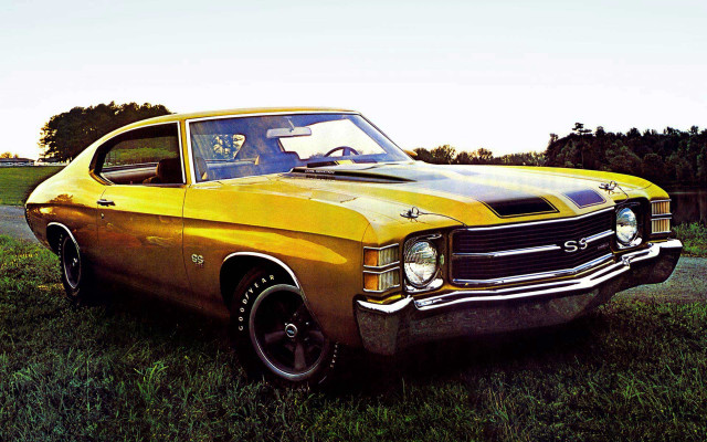 Yellow car grassy field road free wallpaper - medium preview image