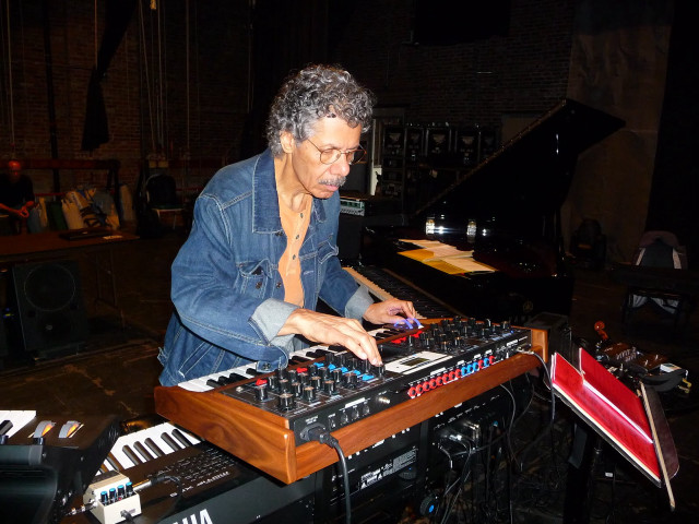 Man playing keyboard room piano free wallpaper - medium preview image
