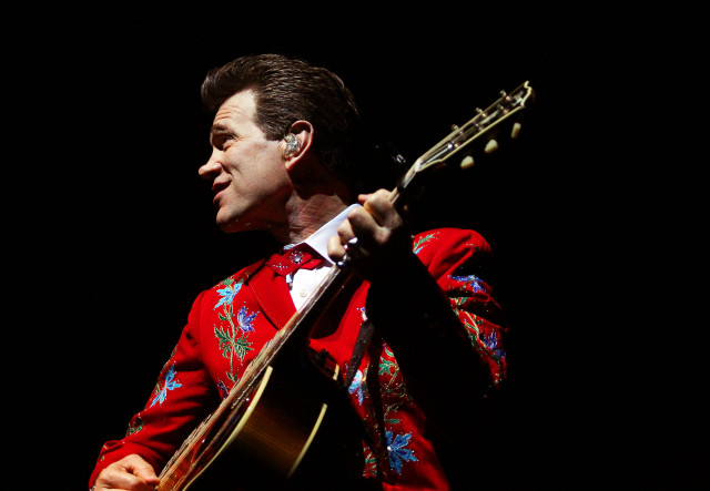 Man red shirt guitar microphone free wallpaper - medium preview image