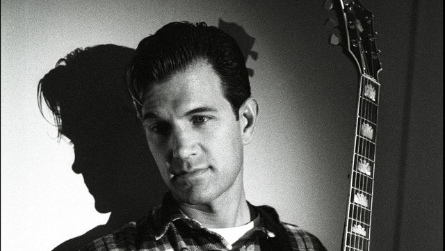 Man holding guitar shadow person free wallpaper - medium preview image