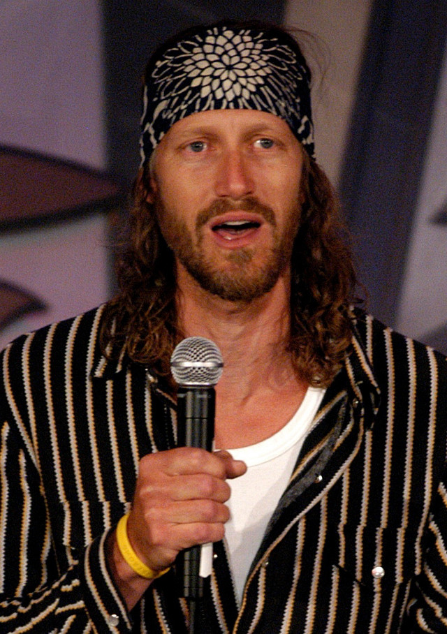 Man microphone speaking hat hand free wallpaper - medium preview image