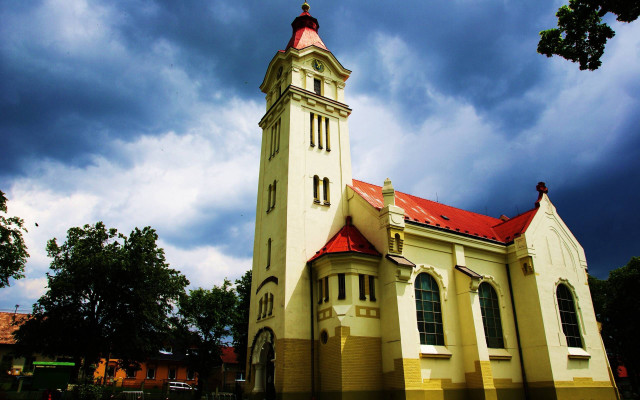 Church red roof cloudy sky free wallpaper - medium preview image