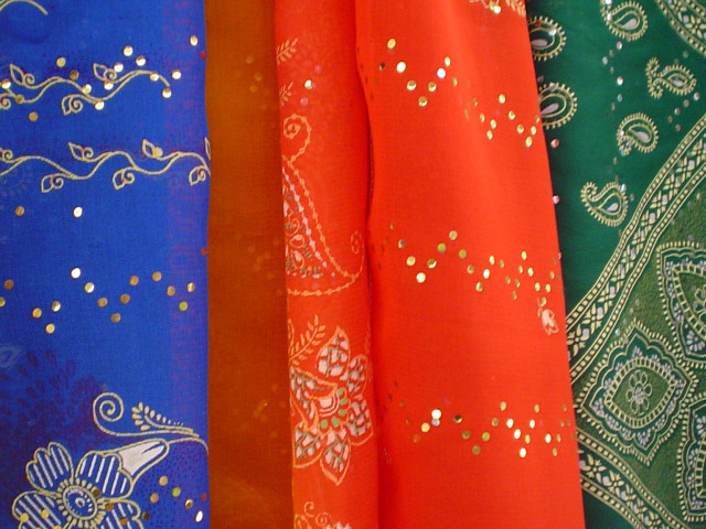 Cat on colorful fabric folk free wallpaper - medium preview image