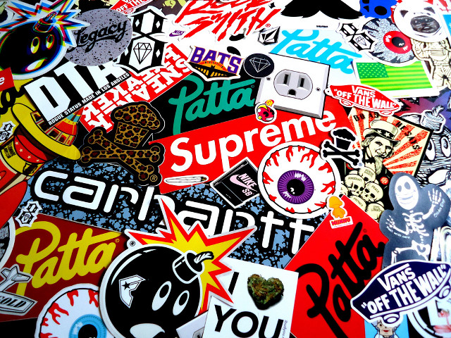Stickers pile photograph shop chaos free wallpaper - medium preview image