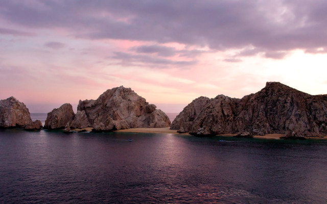 Rocks water beach sunset dawn free wallpaper - medium preview image