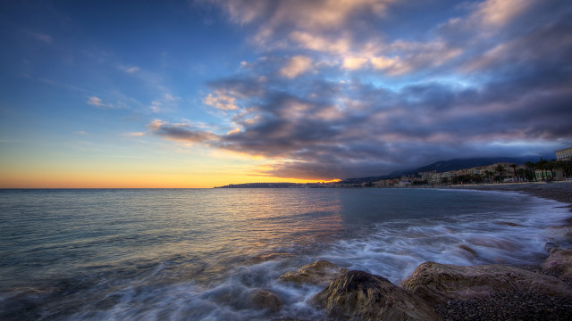 Beach water sunset clouds building free wallpaper - medium preview image