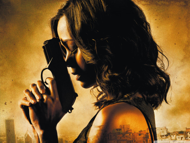 Woman gun looking down city free wallpaper - medium preview image