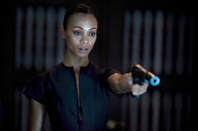 Woman holding gun dark room #3 free wallpaper - medium preview image
